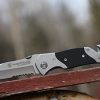 Smith & Wesson SWFRS 8in High Carbon S.S. Folding Knife with 3.3in Drop Point Serrated Blade and S.S. with G-10 Inlay Handle for Outdoor, Tactical, Survival and EDC - Image 4